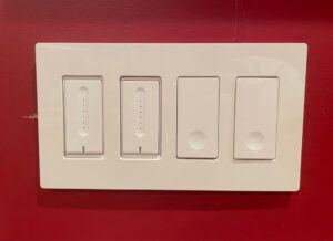 Single pull and dimmer switches installed